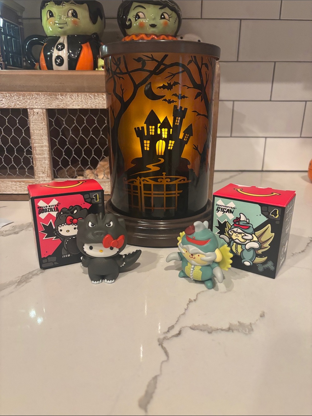 McDonald's Hello Kitty Godzilla and Pompompurin Gigan Figurines